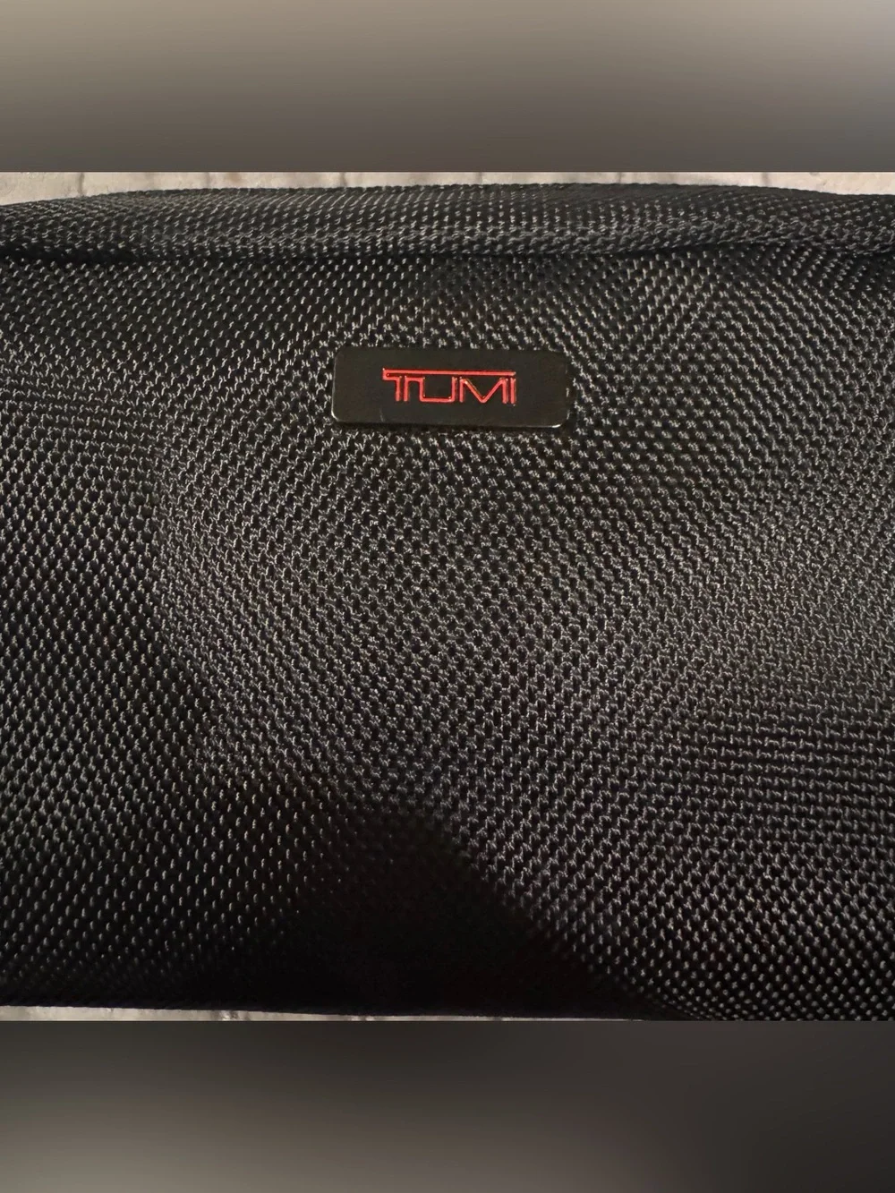 Tumi Black Toiletry Pouch with Red Logo Delta Airlines